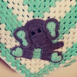 green sitting elephant blanket